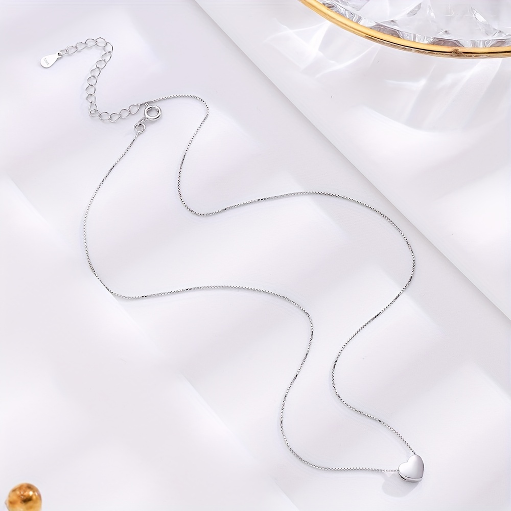 Collana con ciondolo a forma di cuore lucido 3D in argento sterling 925. Catena semplice con clavicola d'amore, colore argento