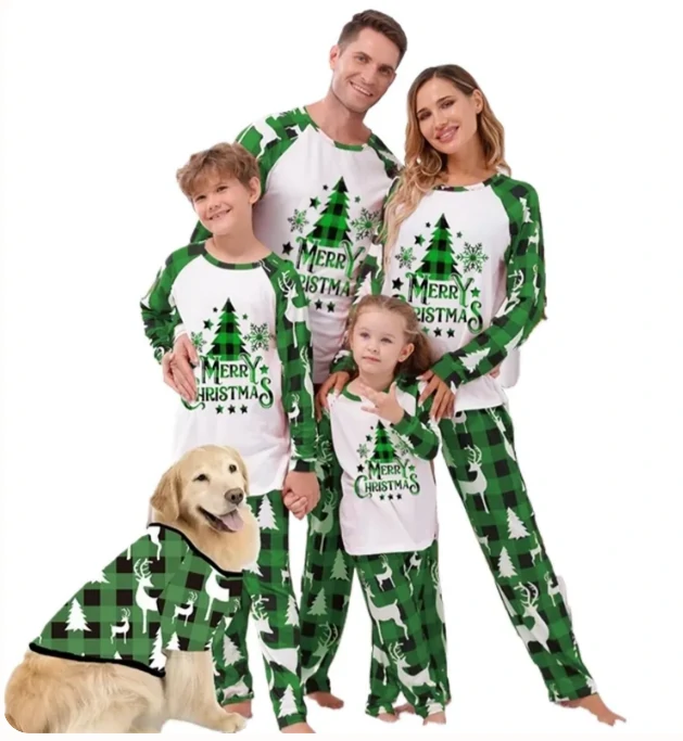 Family dressed in matching green Christmas pajamas with a "Merry Christmas" tree design, including a dog wearing a coordinated holiday outfit.