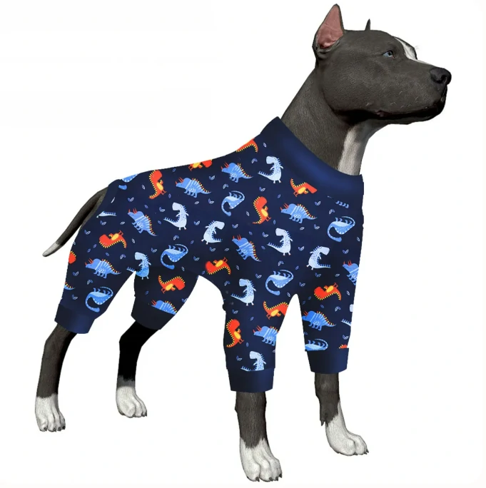 Illustration of a grey dog wearing navy blue pajamas with colorful dinosaur patterns.