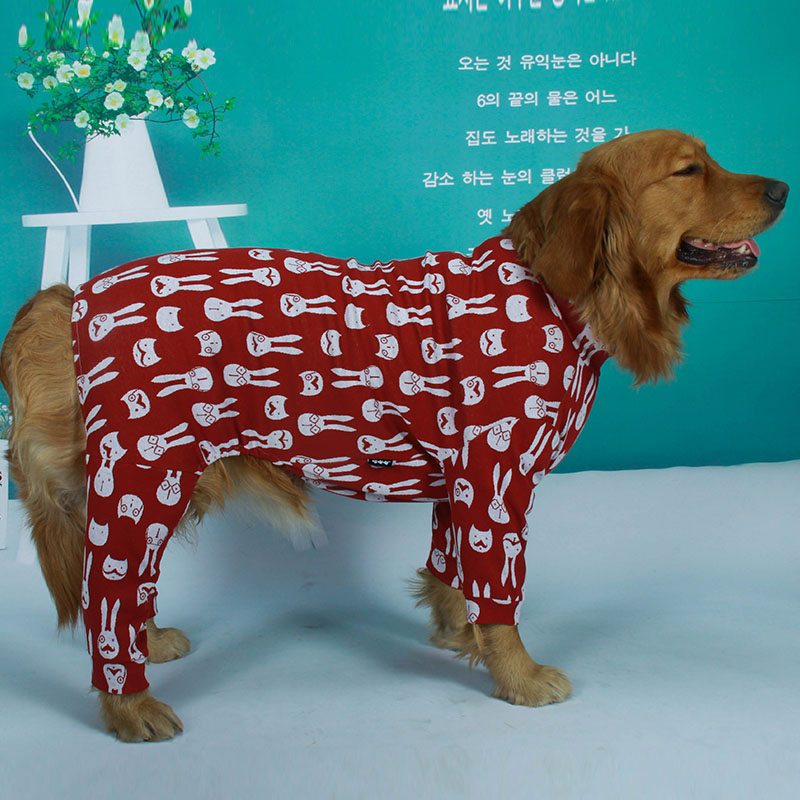 Golden Retriever wearing Lovinpet purple dog pajamas with a white rabbit pattern, showcasing a comfortable and stylish design for large dogs.