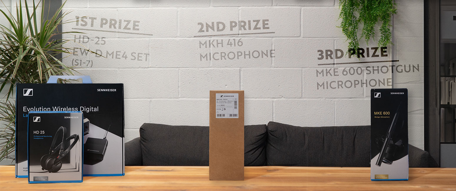 Sennheiser prizes on table. first prize Sennheiser Evolution Wireless Digital Set + HD-25 headphones, Second prize Sennheiser MKH416 Microphone, third prize Sennheiser MKE 600 Microphone