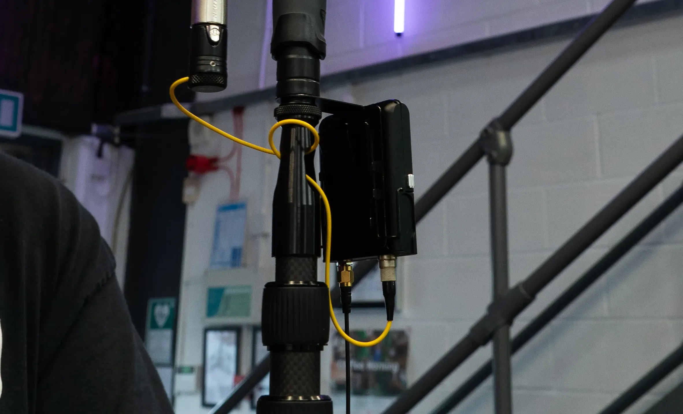 Deity Microphone DLTX Transmitter on boom pole behind shot 
