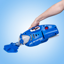 Hand holding Pool Blaster Max Li by the handle
