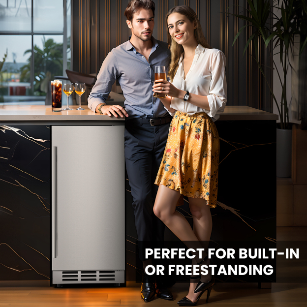 Stylish couple standing next to a sleek 15-inch stainless steel beverage fridge, built into a modern kitchen counter. Text highlights its versatility for built-in or freestanding installation.