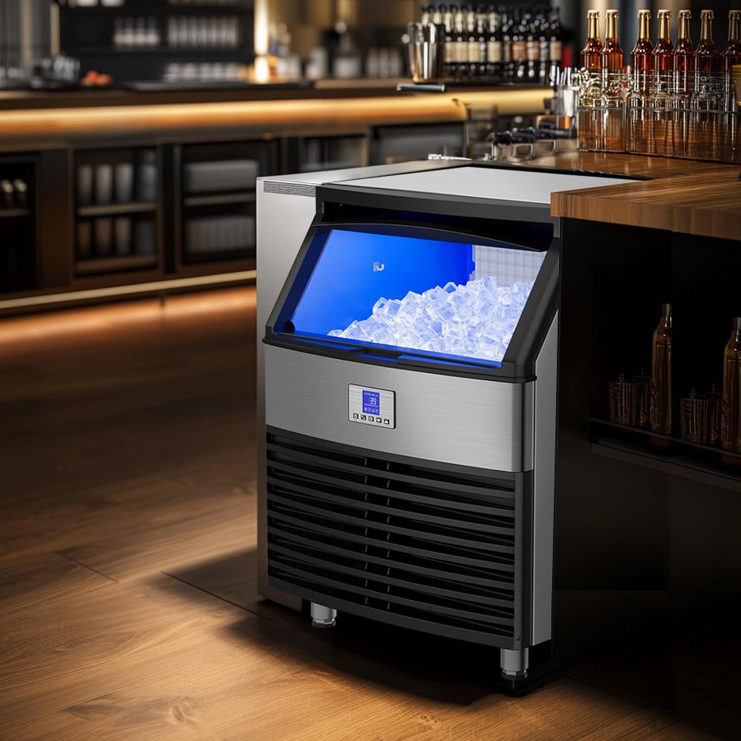 Commercial ice maker installed in a stylish bar setting, producing high-quality ice cubes with a modern stainless steel design and blue interior light, perfect for restaurant and bar environments requiring a consistent ice supply.