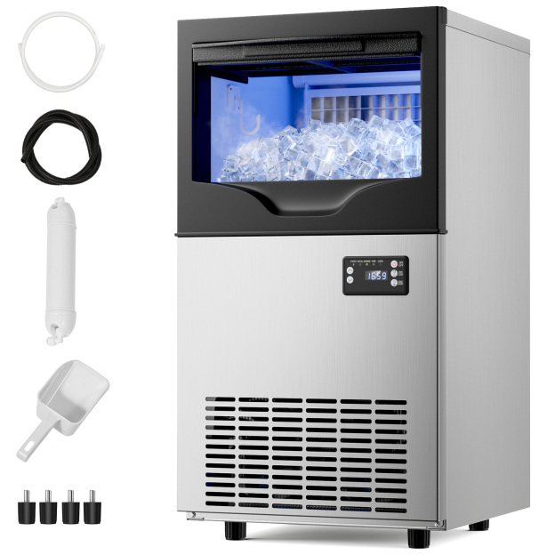 A Mojgar commercial ice maker machine with 100 lbs per day capacity, 33 lbs storage, and essential accessories including a water filter, hose, ice scoop, and connectors, featuring a sleek stainless steel design.