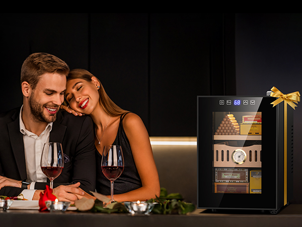 Mojgar electric cigar humidor, elegantly presented as a gift with a bow, keeps cigars fresh and well-preserved, making it an ideal choice for cigar enthusiasts.