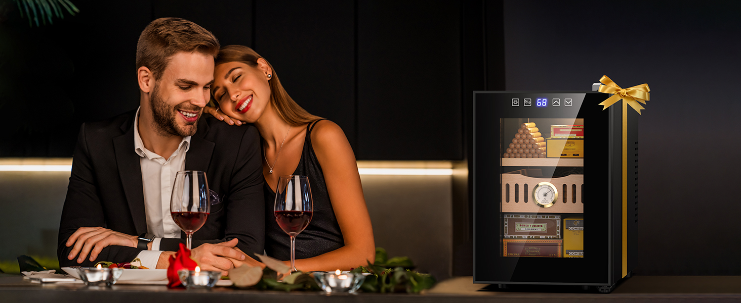 Mojgar electric cigar humidor, elegantly presented as a gift with a bow, keeps cigars fresh and well-preserved, making it an ideal choice for cigar enthusiasts.