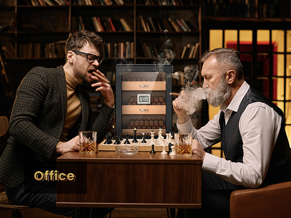 Office setting with two men enjoying cigars and whiskey over a chess game, featuring a carbon fiber cigar humidor with wooden drawers and a hygrometer, blending leisure with sophistication.
