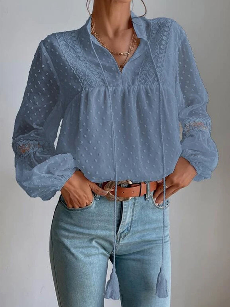 Lace blouse with long sleeves and V-neck