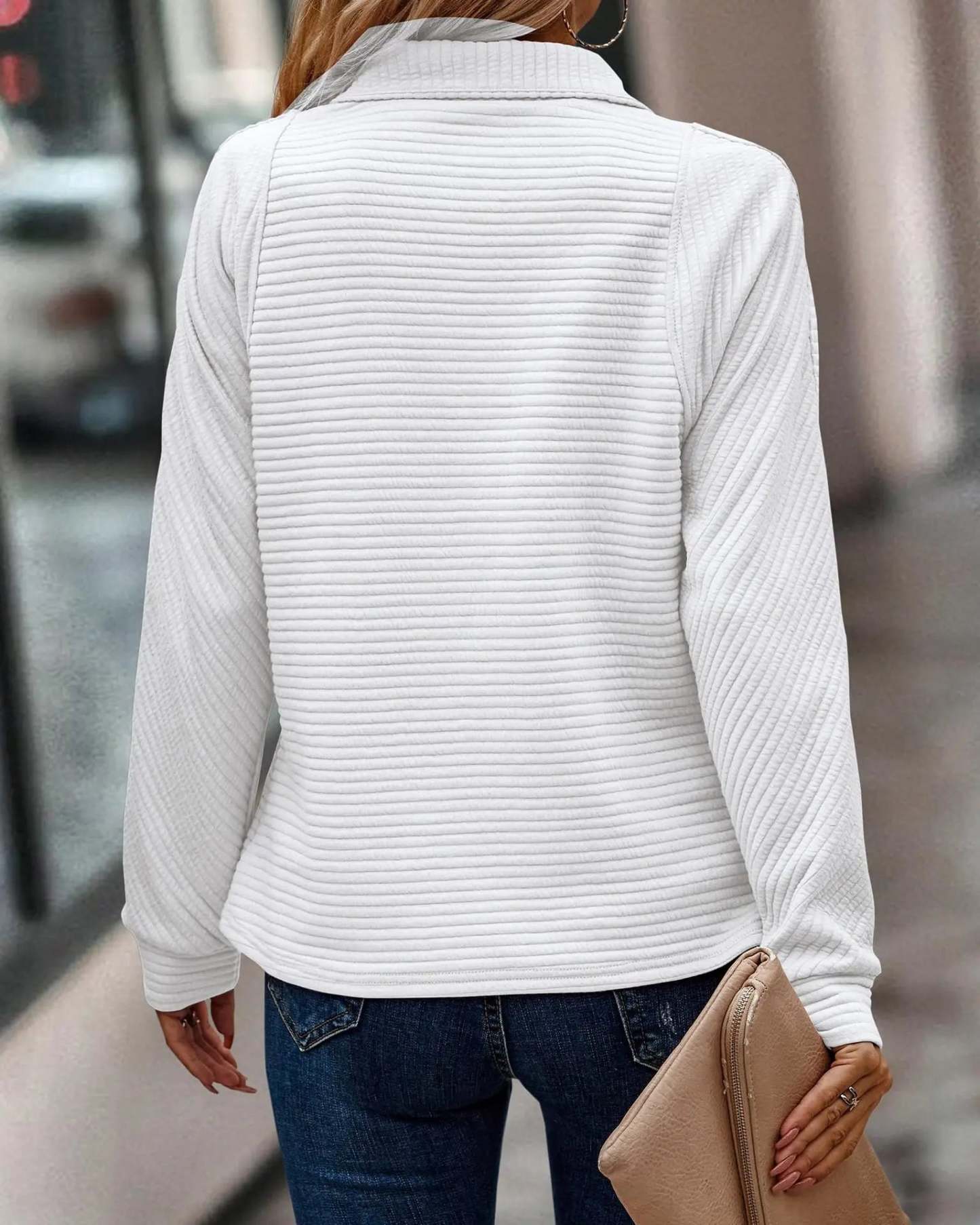 Elegant V-neck sweater for ladies.