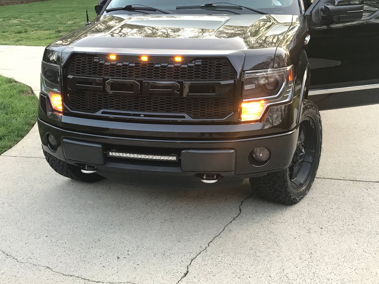 Front Grille For 2009-2014 Ford F150 Raptor Style Grill with Amber LED Light Matte Black