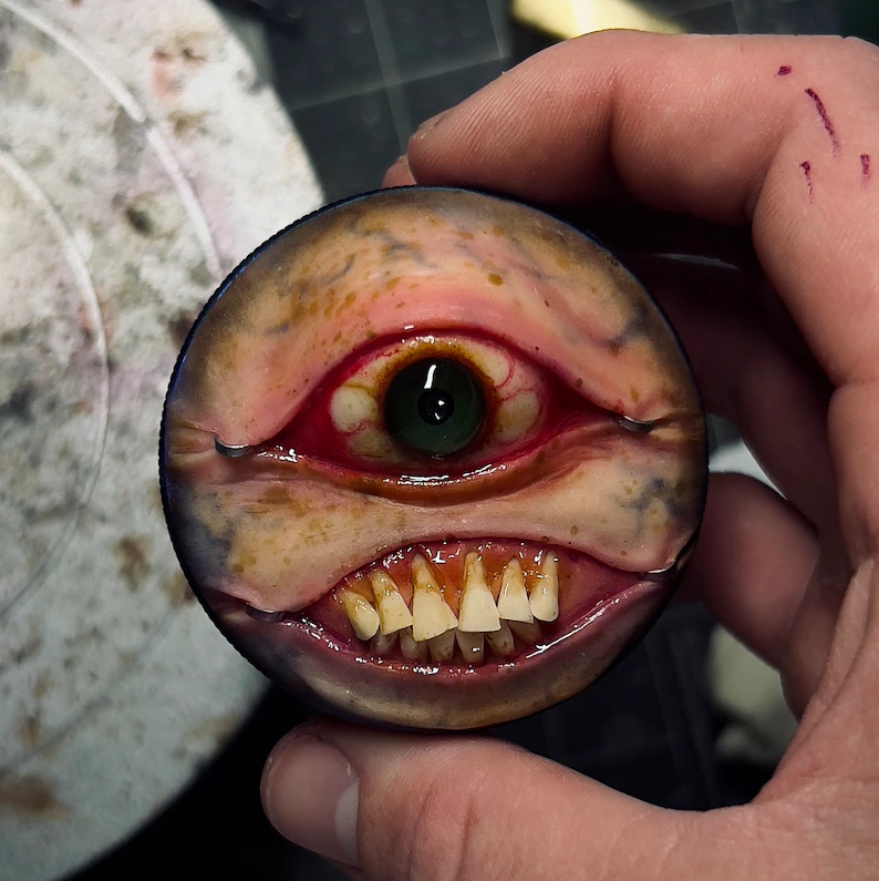 Evil bottle cap grinder