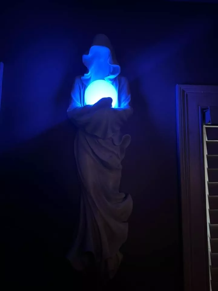 Wall mounted glowing ghost
