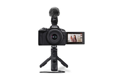 EOS R50 With Microphone On a Tripod Stand