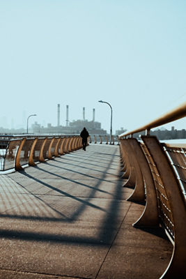 Image of walking bridge with person in distance