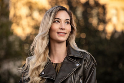 Person Smiling in a Park