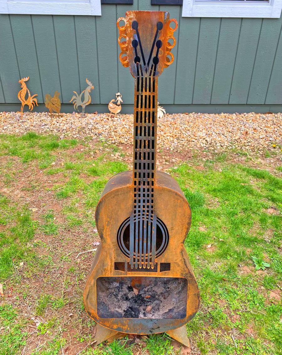 Guitar Fire Pit - Metal guitar shaped wood burning stove