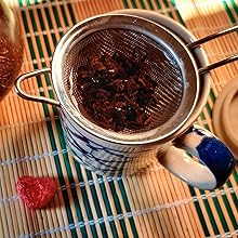 pu-erh tea brewing in the mug