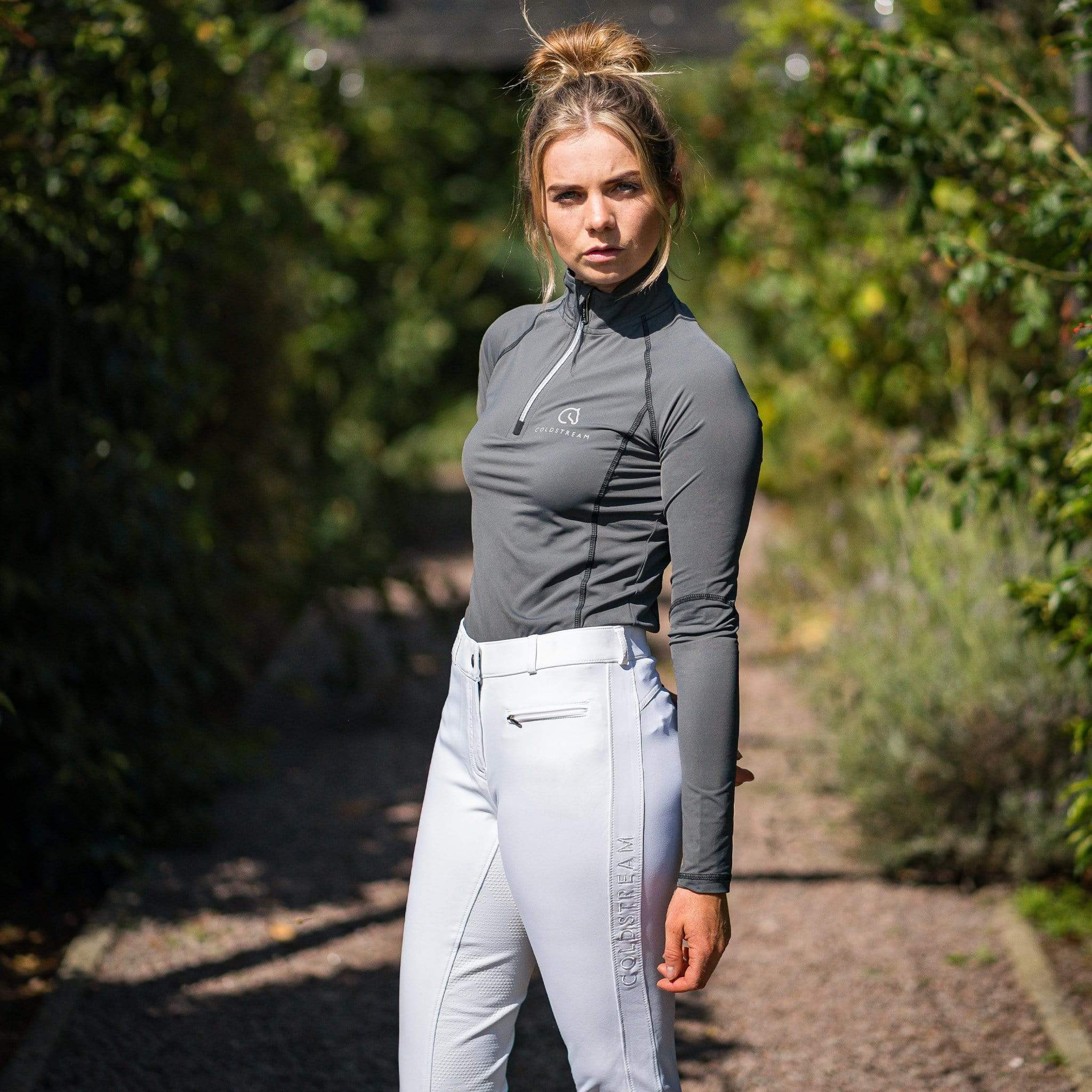 Coldstream Lennel Base Layer 21167 Grey and Black On Model In Garden Side View