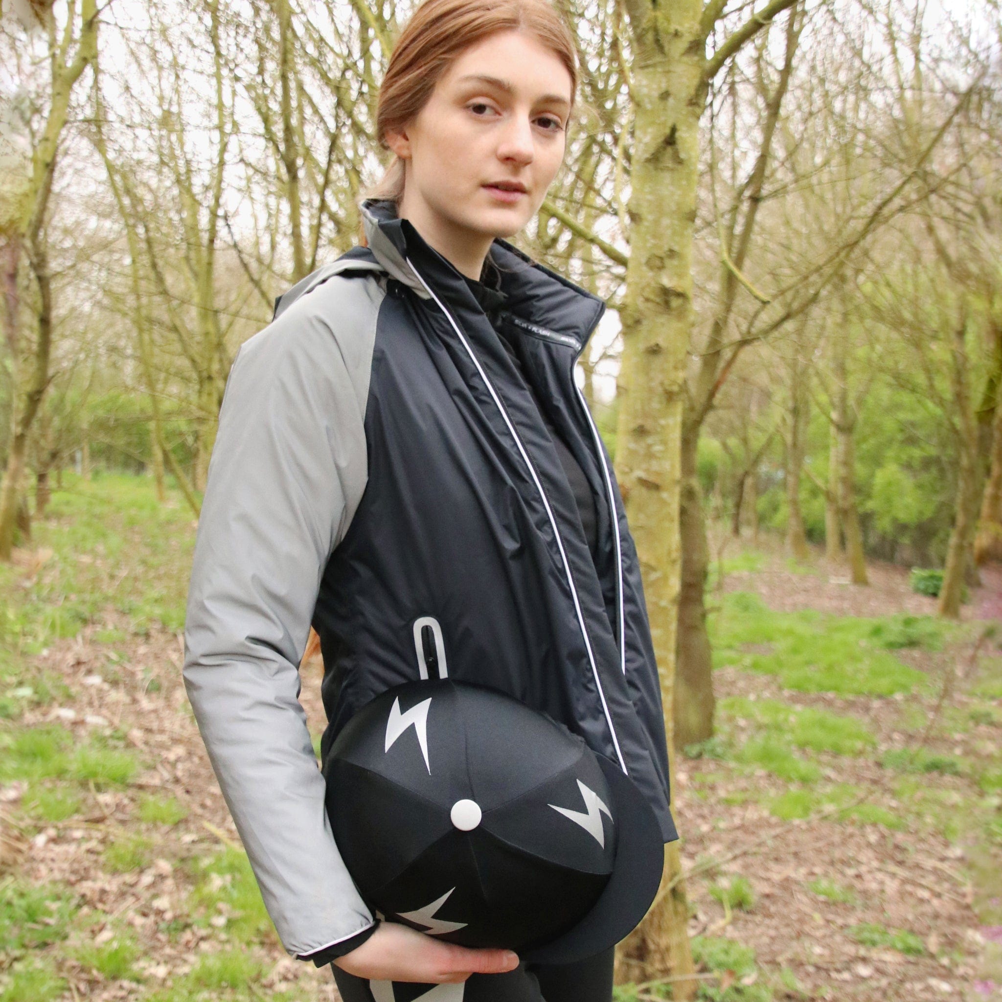 Hy Equestrian Silva Flash Reflective Hi Viz Waterproof Padded Jacket 33572 Black and Silver Side On Rider