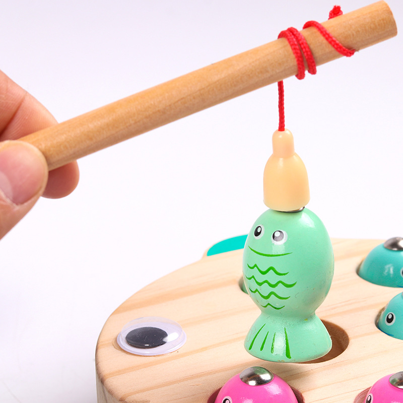Early childhood fishing game with magnetic fishing rod for toddlers, promoting intelligence and concentration, wooden desktop toy.