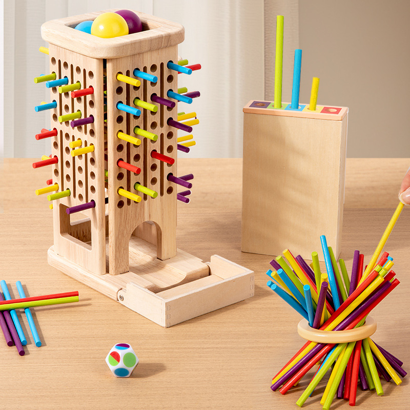 Pulling wooden sticks is an educational and interactive board game for children that trains their thinking skills.