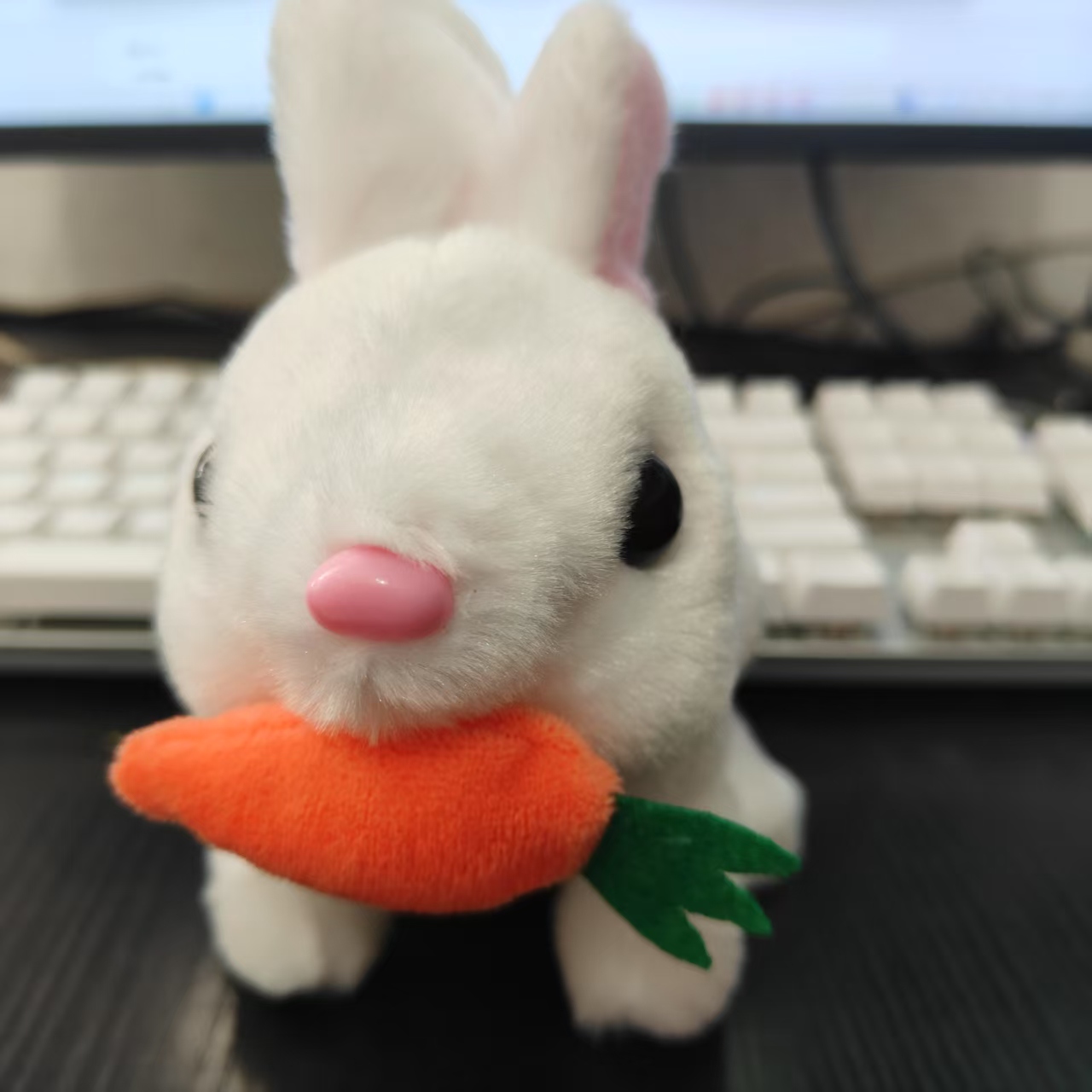 Hot-selling simulation electric carrot rabbit can walk, call and shake ears plush toy