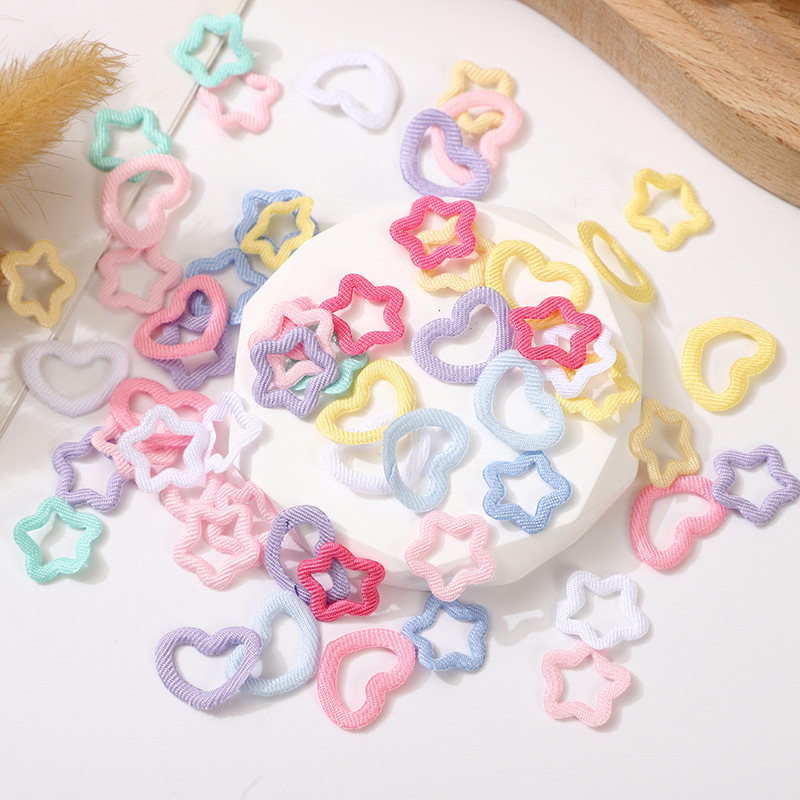 Corazones y Estrellas de Tela Doble Cara con Calado - Componentes para Fabricación de Ropa, Bolsos, Fundas de Móvil y Merchandising - Proveedor Mayorista