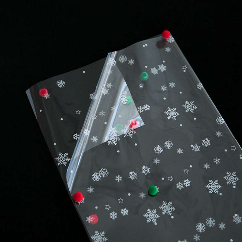 Papel Celofán Navideño con Pompones y Copos de Nieve - Para Ramos de Fresas y Manzanas de Nochebuena | DIY y Floristería-ywys