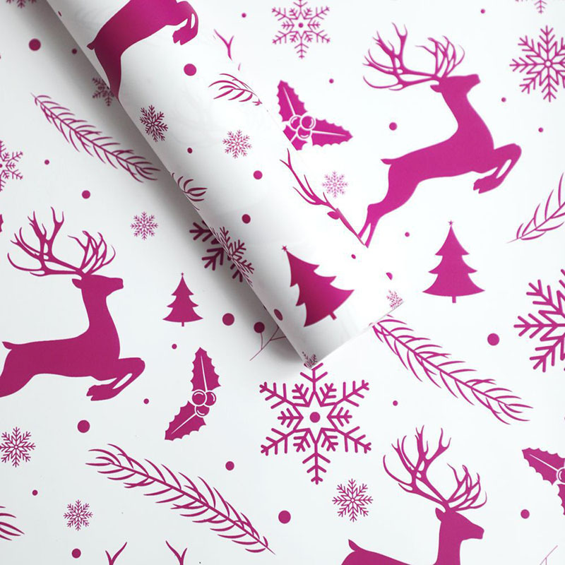 Papel de Regalo Navideño Premium con Diseños de Reno y Copos de Nieve