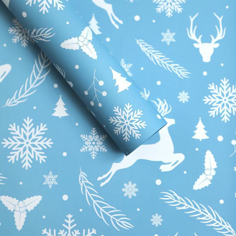 Papel de Regalo Navideño Premium con Diseños de Reno y Copos de Nieve
