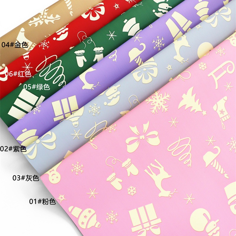 Papel de Regalo Navideño con Diseños de Renos, Muñecos de Nieve y Moños - Para Ramos Florales y Regalos