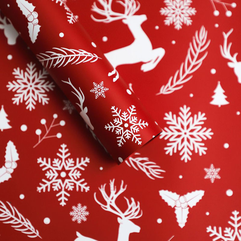 Papel de Regalo Navideño Premium con Diseños de Reno y Copos de Nieve