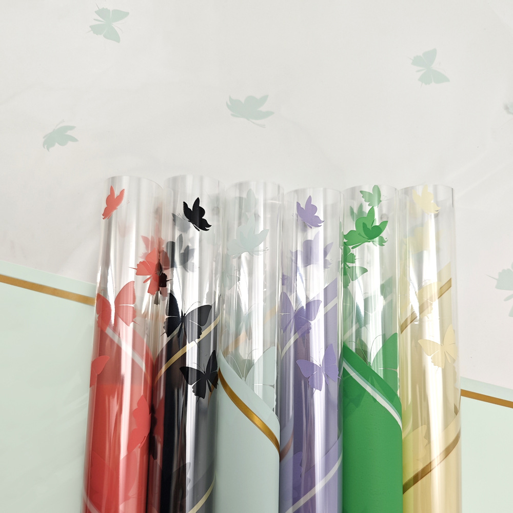Nuevo papel de regalo impreso celofán mariposa bailando papel de regalo de flores coreano（89#）