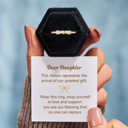 The Arrival Of Our Greatest Gift Gold Bow Ring