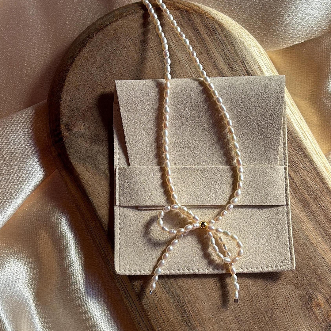 Tiny Pearl Bow Knot Necklace