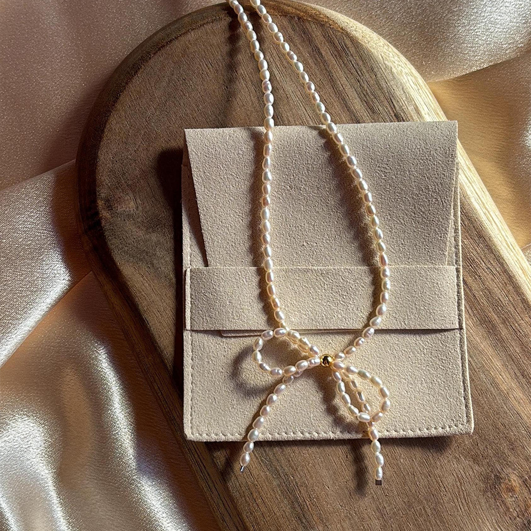 Tiny Pearl Bow Knot Necklace