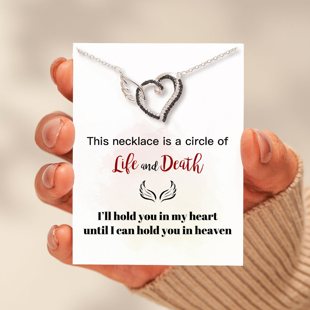 A Circle Of Life And Death Heart Necklace