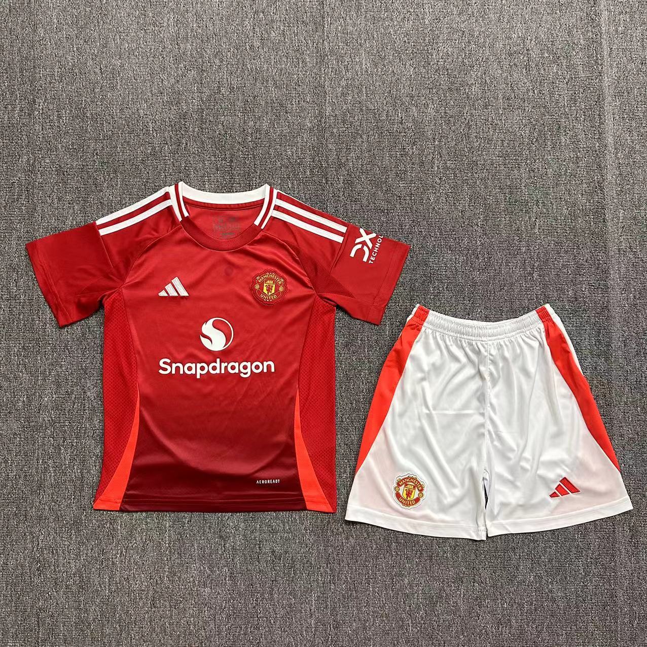 24/25 Manchester United home kids version size 16-28
