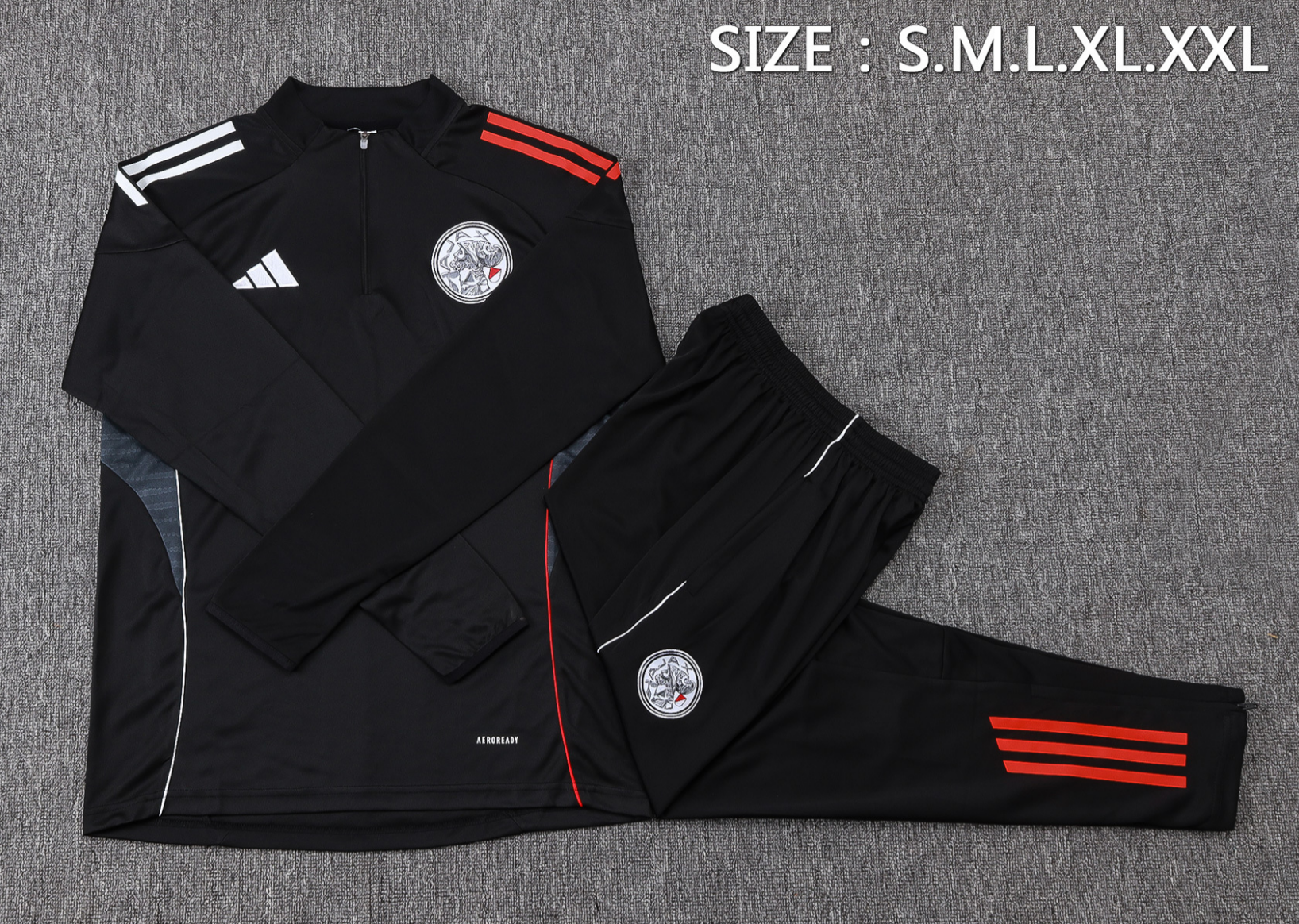 25/26 JAJX Black Half-Zip Jacket Suit