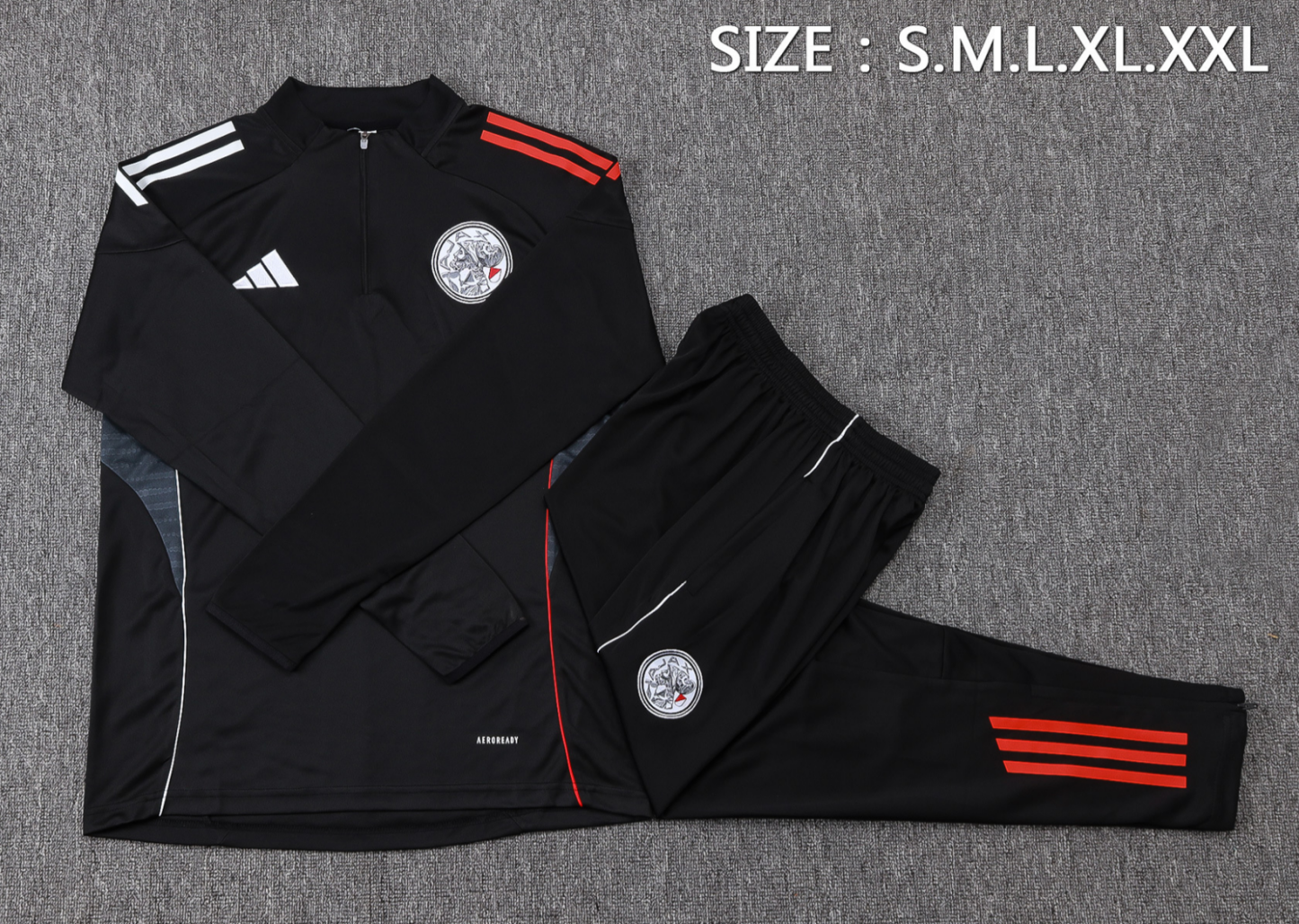 25/26 JAJX Black Half-Zip Jacket Suit