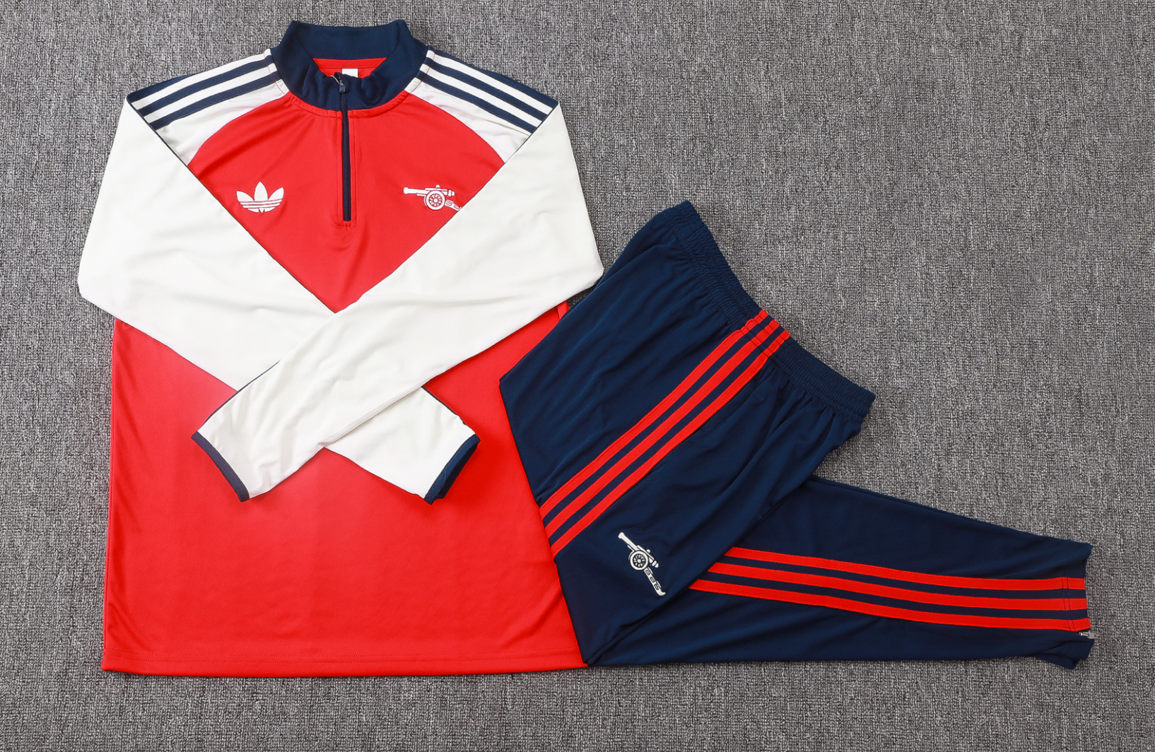 26/27 Arsenal red half-zip jacket version 