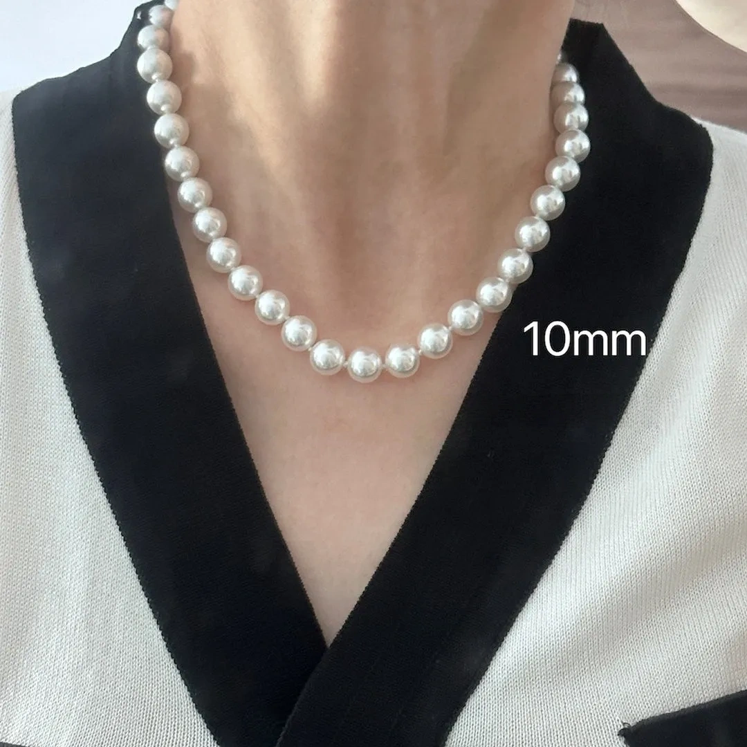 Faux Australian white pearl knotted necklace