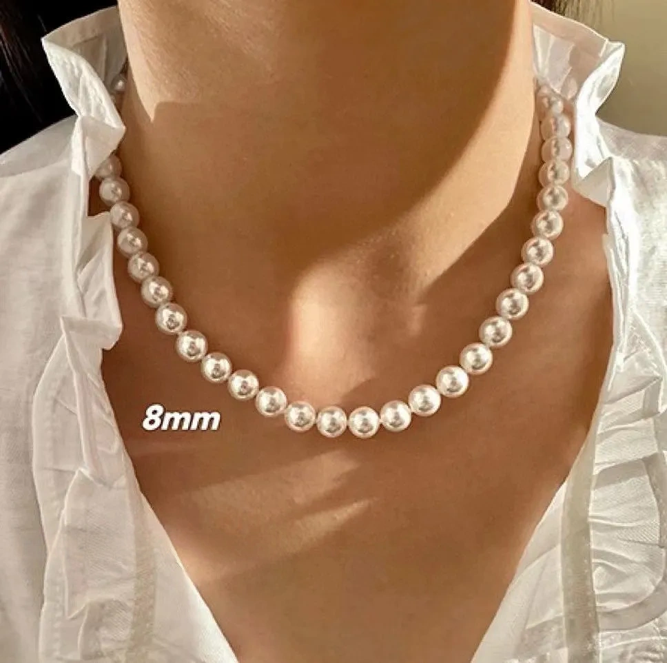 Faux Australian white pearl knotted necklace