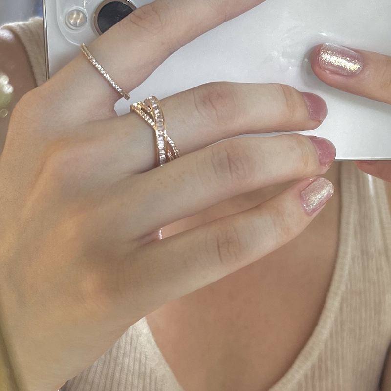 Cross-wrapped gold rings