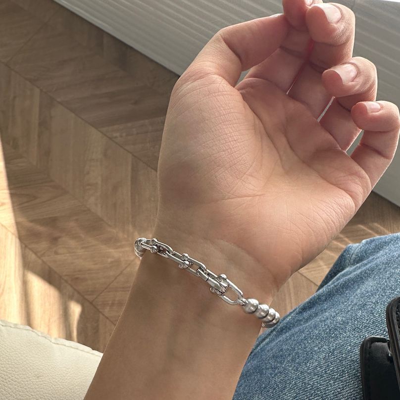 Grey faux pearl panelled horseshoe clasp bracelet