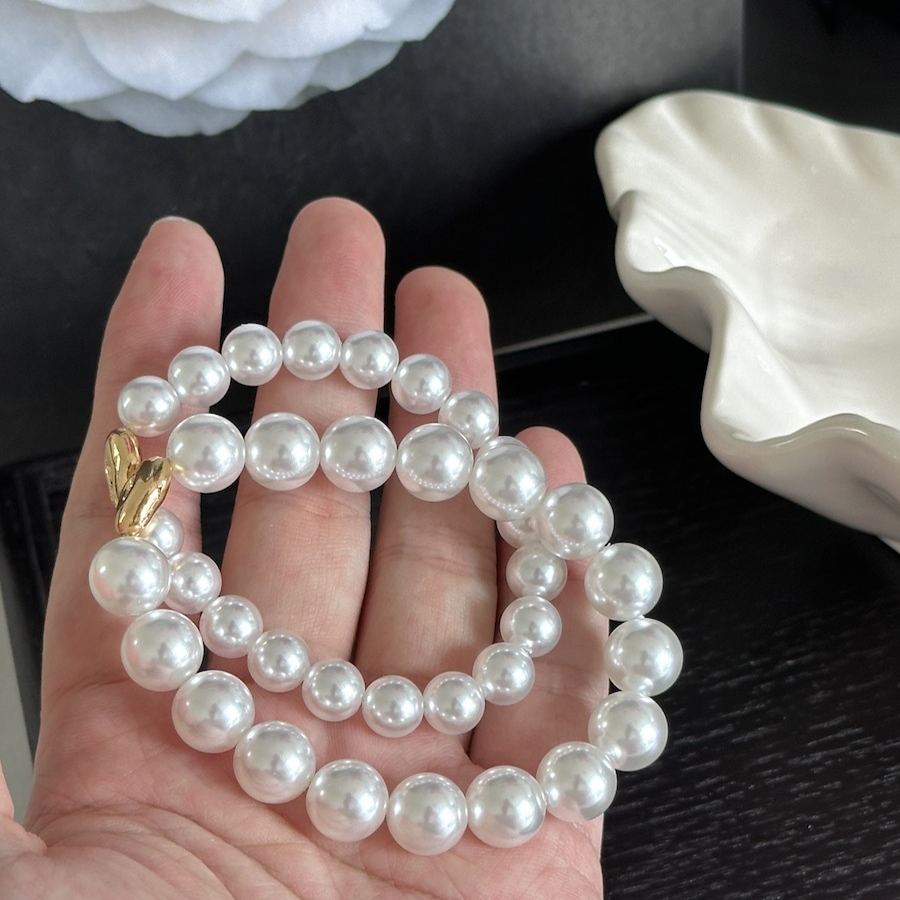 Imitation Australian white faux pearl bungee rope bracelet