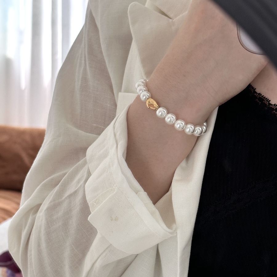 Imitation Australian white faux pearl bungee rope bracelet