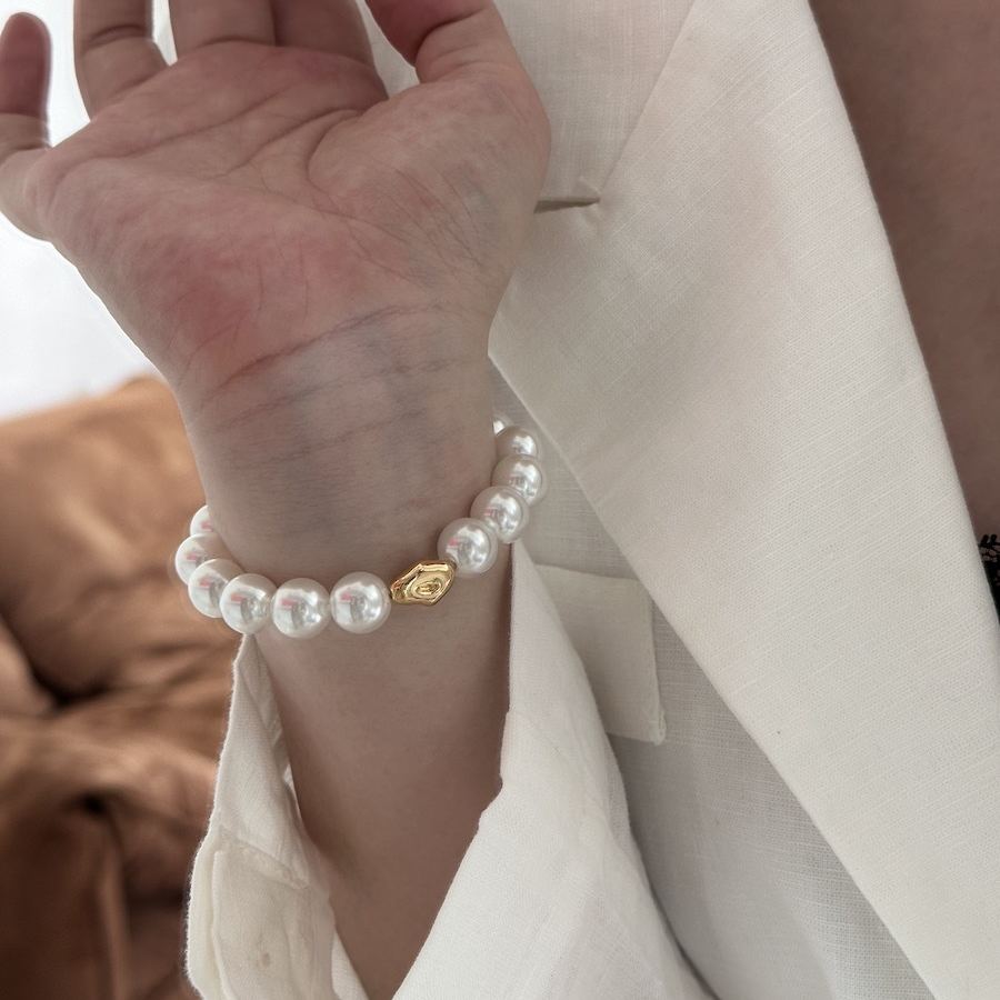 Imitation Australian white faux pearl bungee rope bracelet